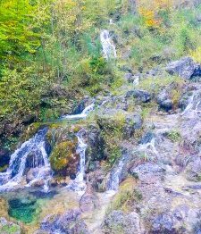 Hikers can see cascading waterfalls when hiking Enipeas' Gorge in Mount Olympus National Park in Greece